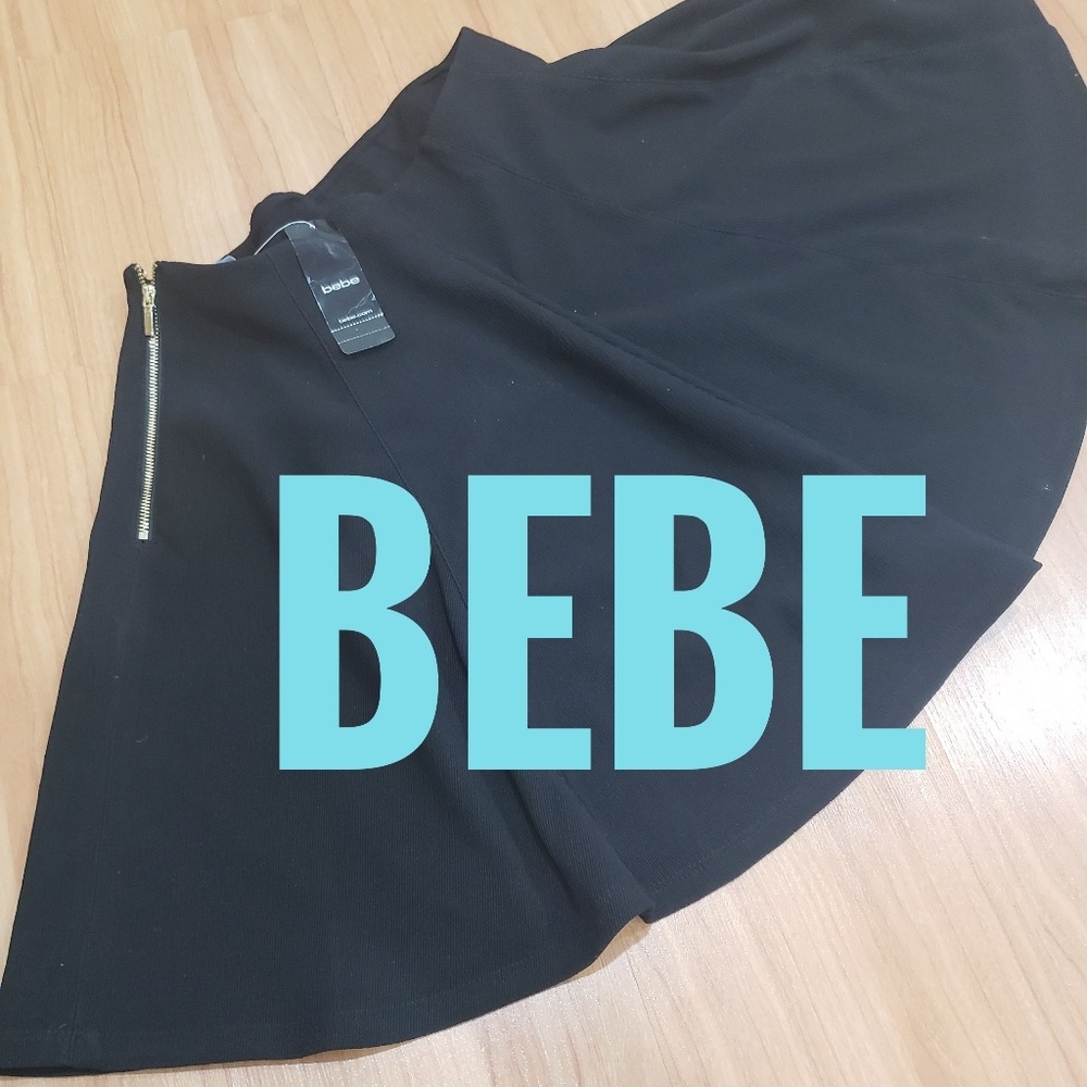 BNWT!!! BEBE black circle skirt M
